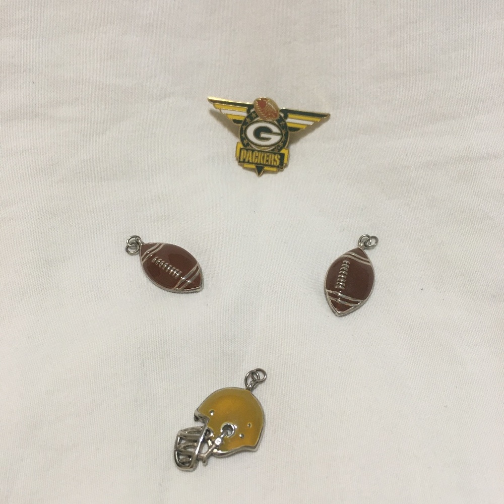 Green Bay packer’s pin and football accessories